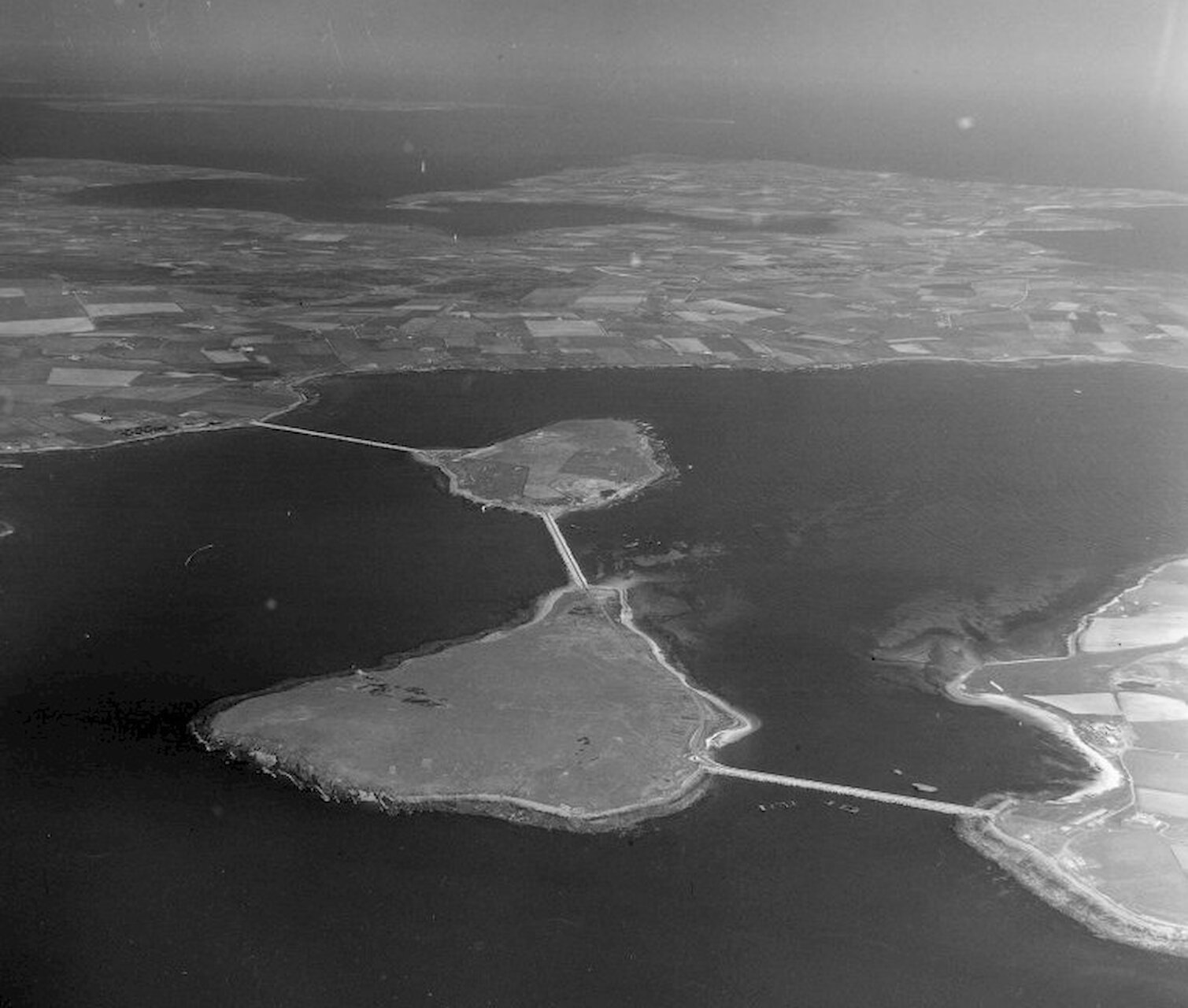 Aerial view of Churchill Barriers, Orkney where G. Gordon Nicol was Superintending Resident Engineer after he had left Arch Henderson