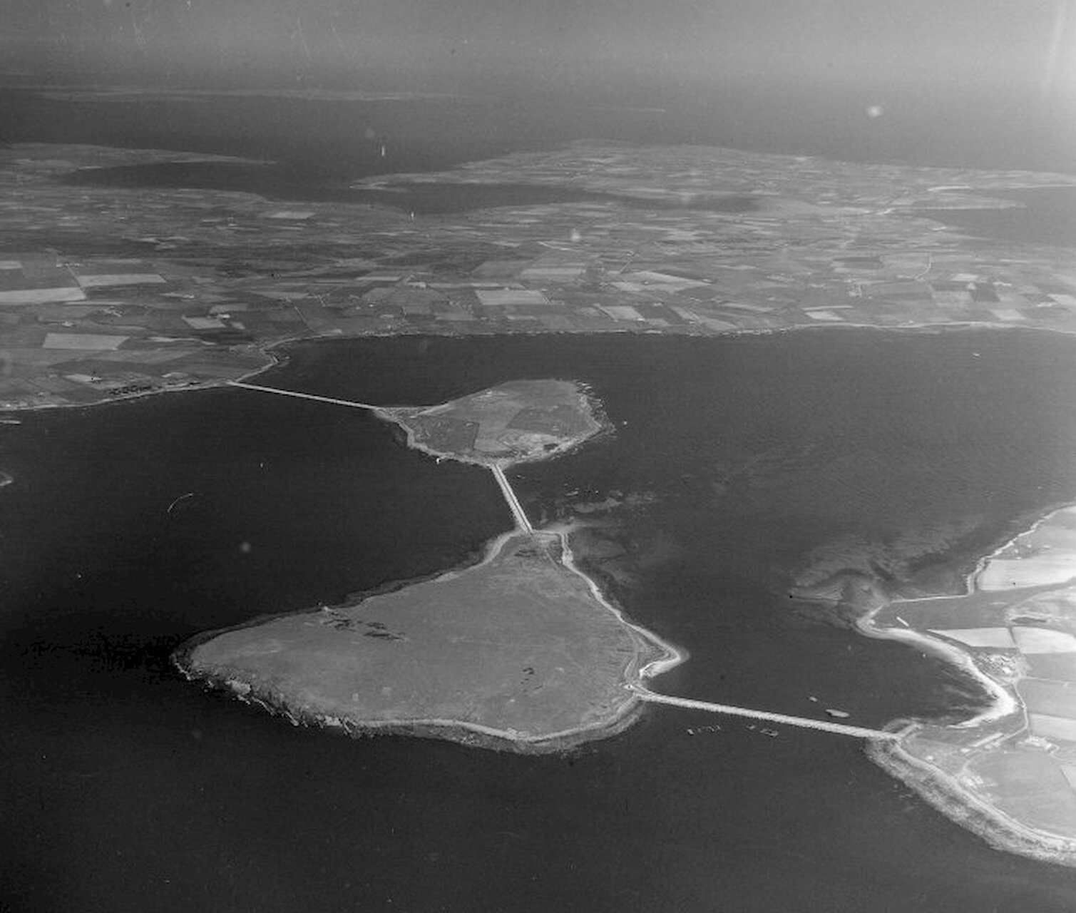 Aerial view of Churchill Barriers, Orkney where G. Gordon Nicol was Superintending Resident Engineer after he had left Arch Henderson